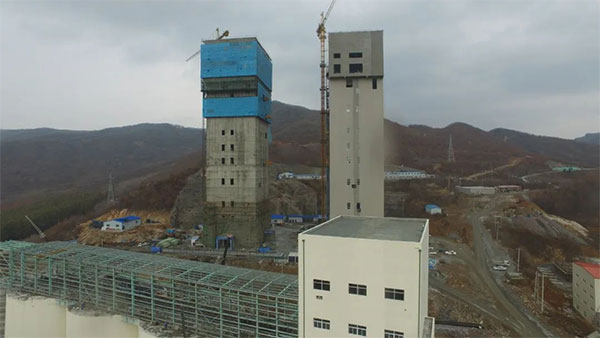 安博官网体育入口(中国)有限公司爆破承建|国内非煤矿山最大体量“双子座”井塔顺利封顶